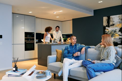 People Socialising In A Canary Wharf Apartment