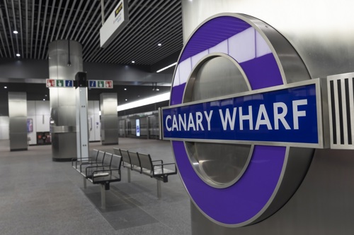 Elizabeth line Canary Wharf purple TfL rounel